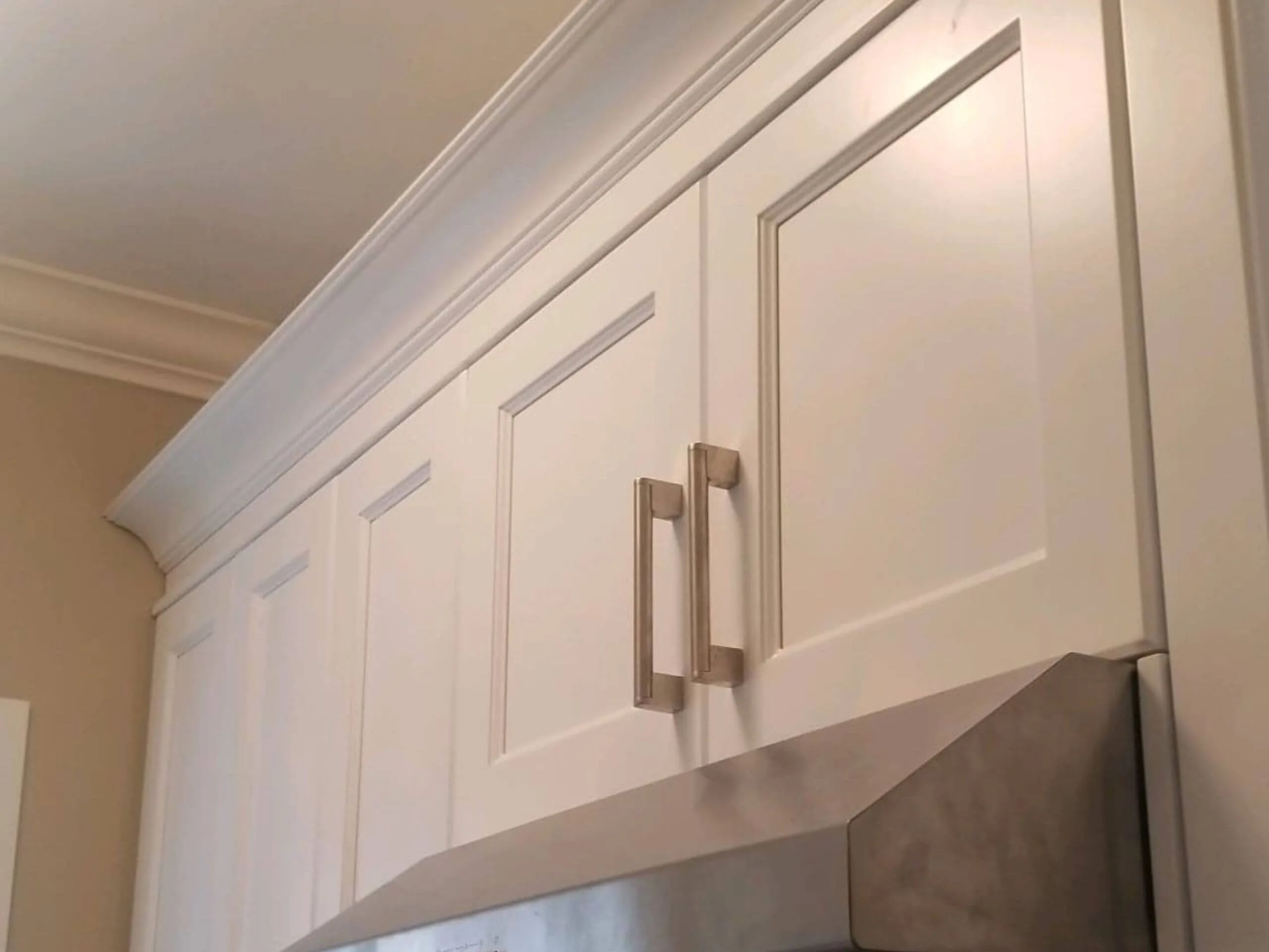 White refinished kitchen cabinets